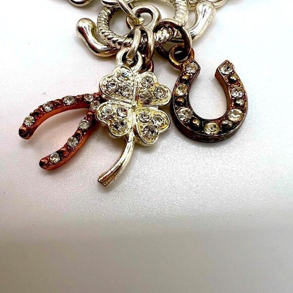*3/$20* Silver tone toggle bracelet with horseshoe clover and wishbone charms - Picture 2 of 3